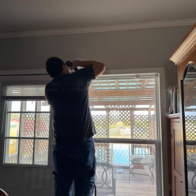 Matt had to hang up some curtain holders. He took down old drapes and broken blinds. Tomorrow, we will do the same in the den.