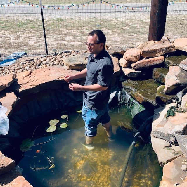 Matt was in the pond cleaning out the algae. Once he was done, we put algae powder in the pond and it got pretty nasty. Matt was in the pond cleaning out the algae. Once he was done, we put algae powder in the pond and it got pretty nasty.
