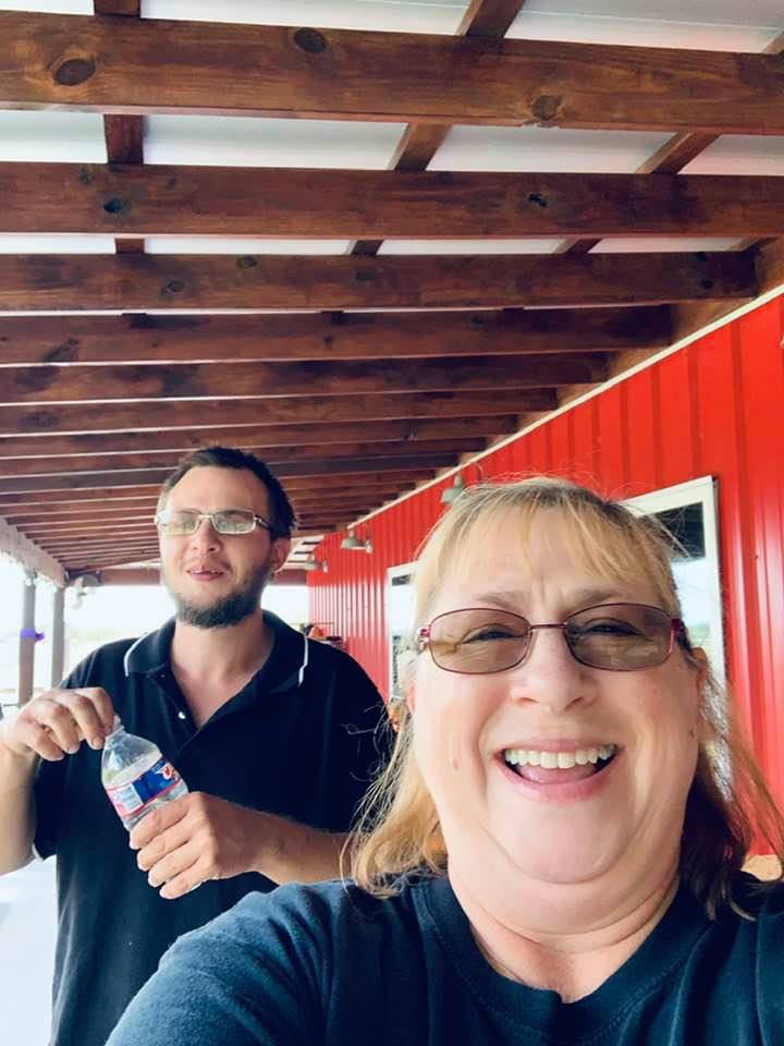 Matt with a beard and me laughing at Farm to Familia in Poteet.