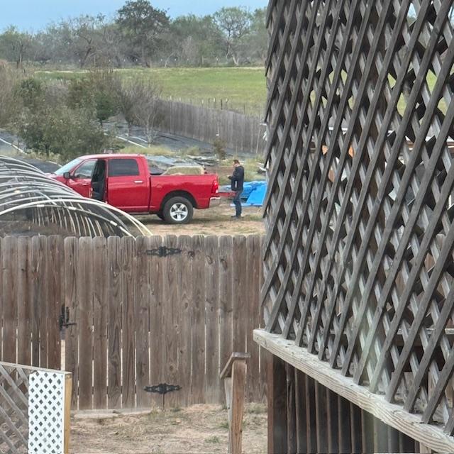 When Matt got here this evening, he unloaded the hay and feed for us.