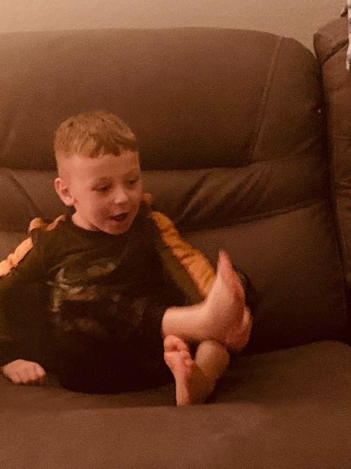 Max in his new dinosaur pajamas.