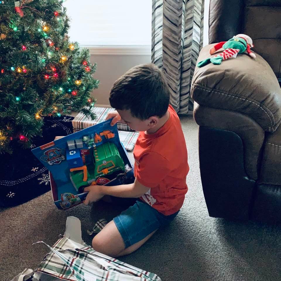 It seems Santa left a few things under the tree for Max.
