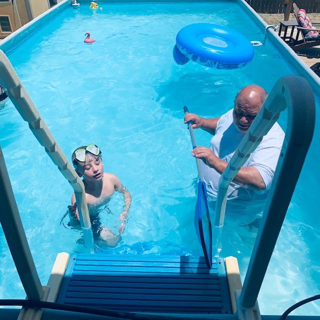 Max and Grandpa in the pool this afternoon.