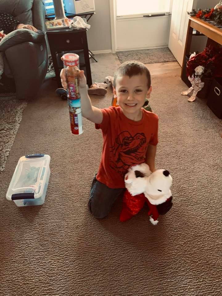 Max had a blast opening gifts today. Here he is with his stocking.