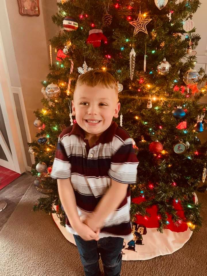 Max in front of the Christmas tree on Thanksgiving Day. He is such a sweet little guy!