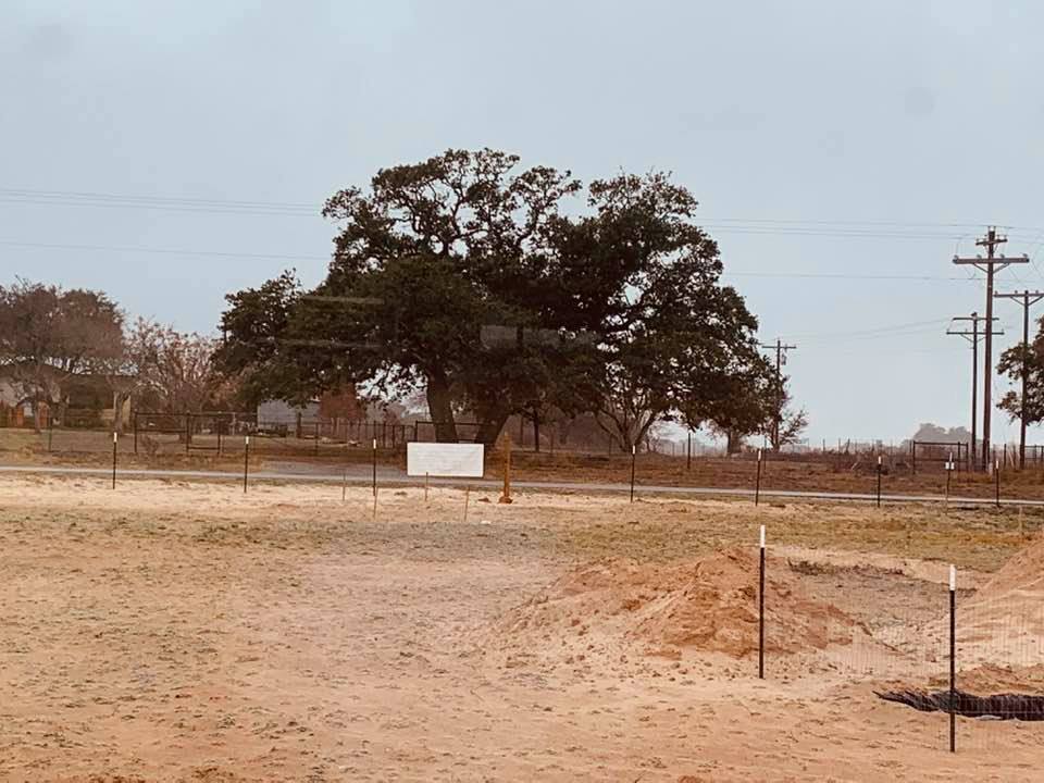 The markers show where the septic, store, and restrooms will be this coming spring. This photo was taken from the living room window.