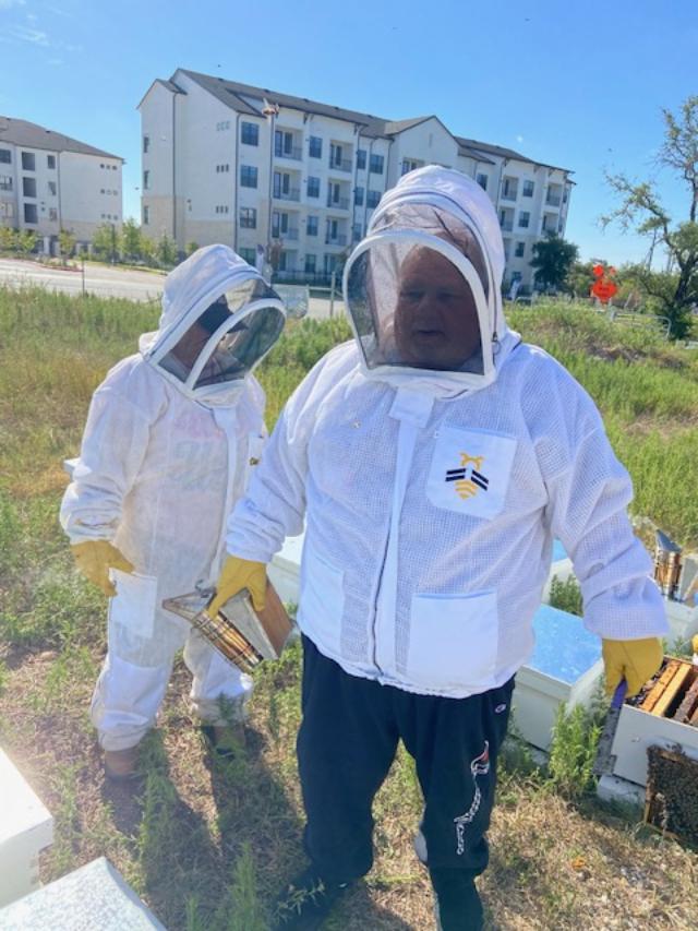 Me on left, David on right. Bees were on him constantly so I am pretty sure they were on me, too.