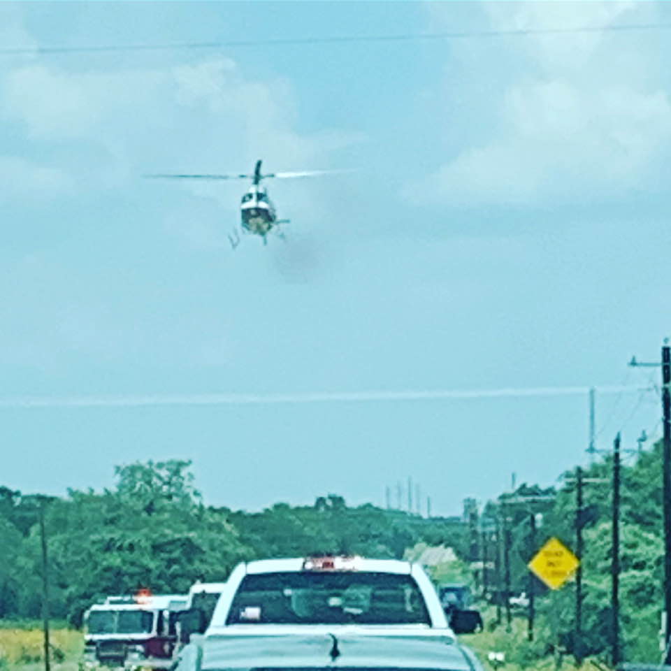 Just down the road from our home, traffic was stopped due to an accident and then the medical helicopter appeared. Just down the road from our home, traffic was stopped due to an accident and then the medical helicopter appeared.
