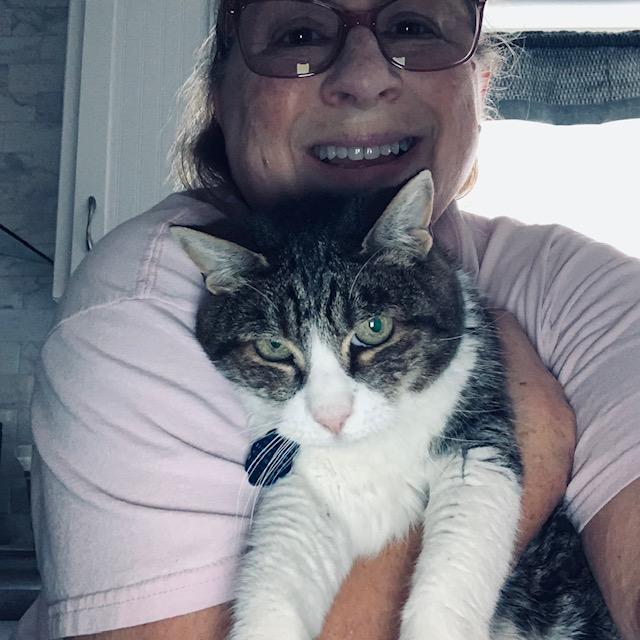 Kitty with me. You can see how thrilled she is to be held!