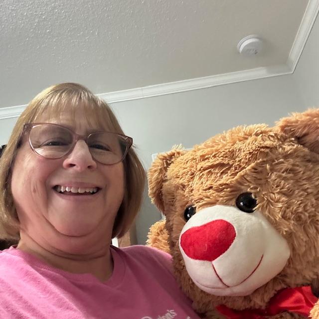 My snuggly bear and me. He is so soft and cute!