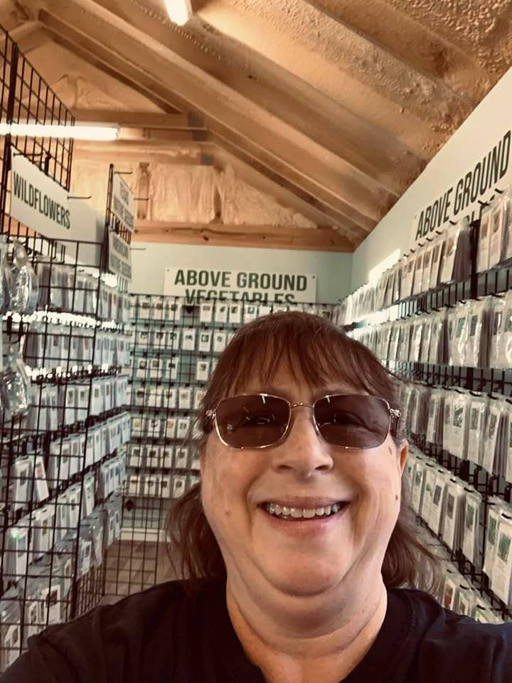 I took this photo of myself with the seeds in our store while working today.