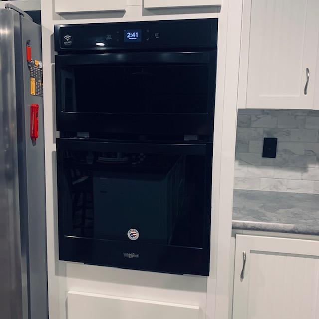 This is the microwave/oven combo unit. The microwave is at the top and works. The oven is no longer turning off, even when we turn it off. That is a good way to start a house fire so we had to get rid of it.