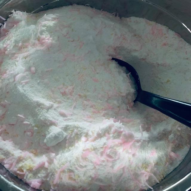 Here I am mixing the grated yellow and pink bars into the bowl of powders. I think I need a bigger bowl for mixing my DIY laundry soap.