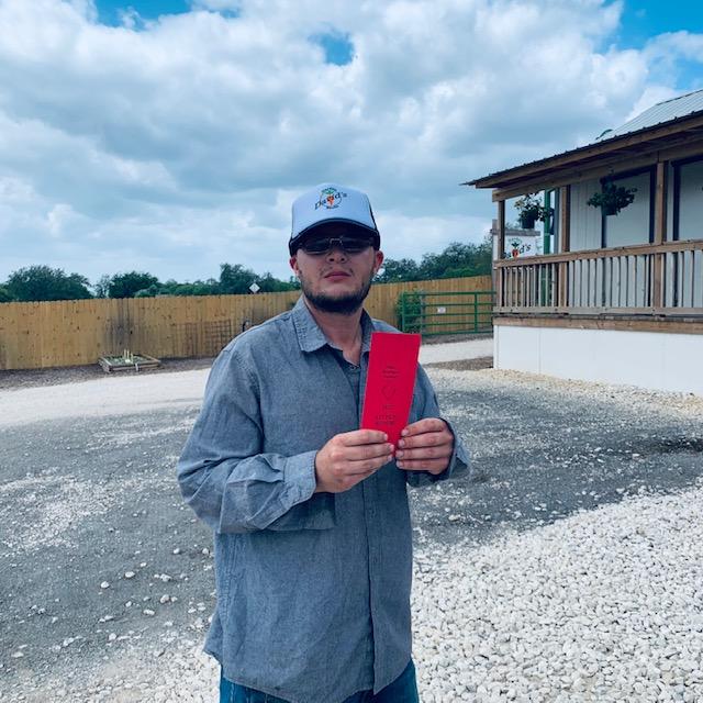 Matt in our parking lot with the auction tickets and our official David's Garden Seeds® trucker cap. I offered one to Jay as well for the auction, but he would not wear it.