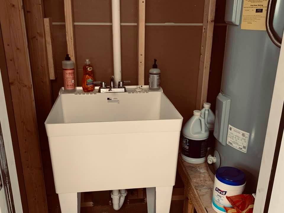 A utility sink for a mop is also a requirement for a commercial sink.
