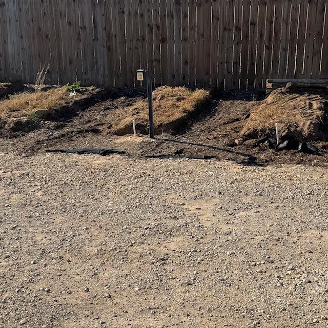 The man dug up five mounds of dirt to go with the raised garden bed hoop houses he bought from us.