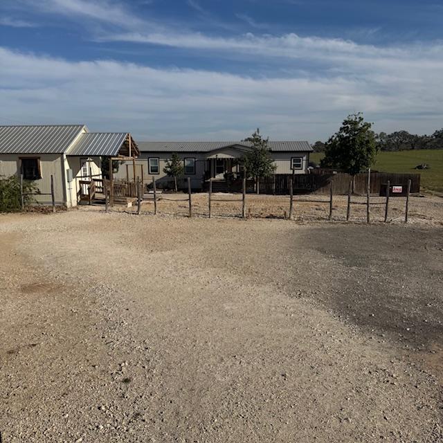 From the kitchen building porch, it looks weird to see the house. Now, what will we do with this space?