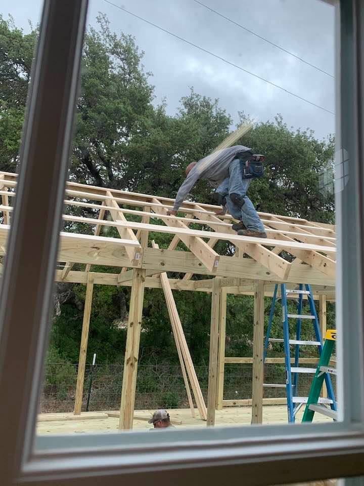 Framing the gazebo which is over part of the fish pond.