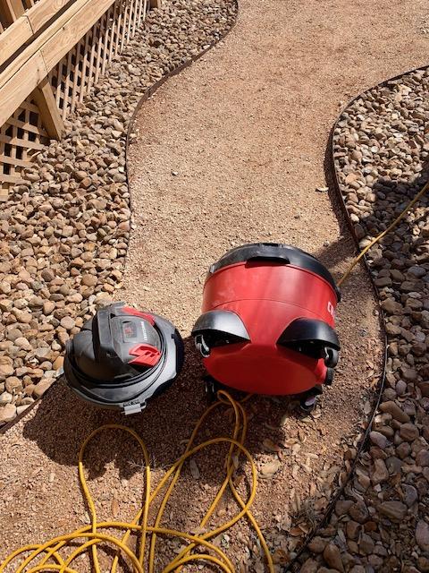 Nacho is cleaning out the pond of algae with his shop vacuum. The algae grows so quickly. Matt has been cleaning it out by hand.