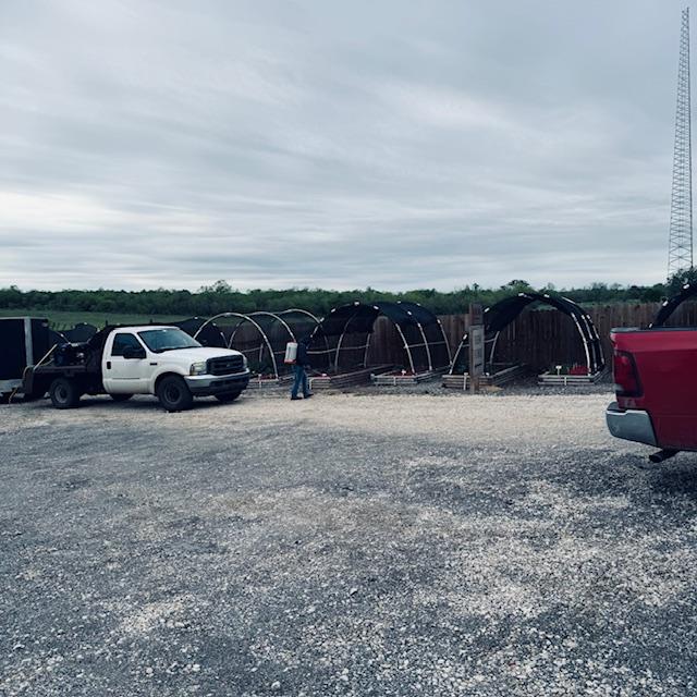 Nacho is spraying something all around. You can see the mobile pet grooming unit in this photo as well. Nacho is spraying something all around. You can see the mobile pet grooming unit in this photo as well.