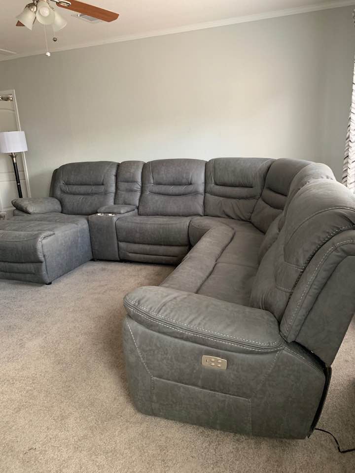 Our new living room sectional is so pretty. I sprayed it with Scotch Guard this afternoon.