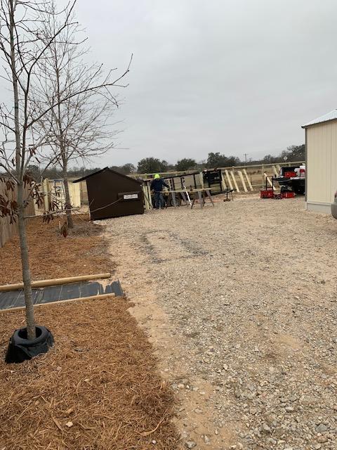 Nacho is out there hard at work and has been since 7am building the gates and fence to block off the back of the property.