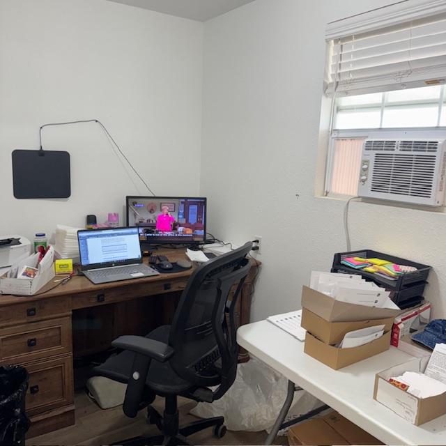 This is my new office. I got batteries for the DVD remote and it works. (It's all about priorities, folks!)