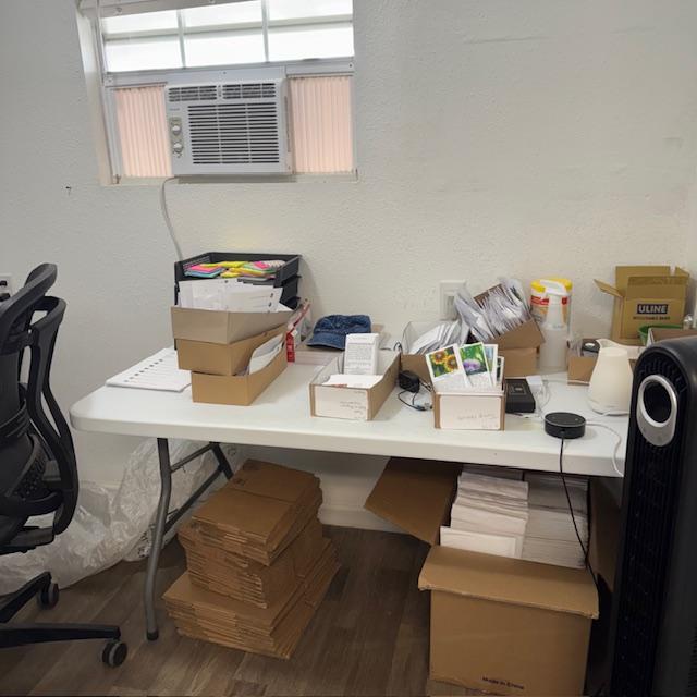 Orders and mailing supplies at this table.