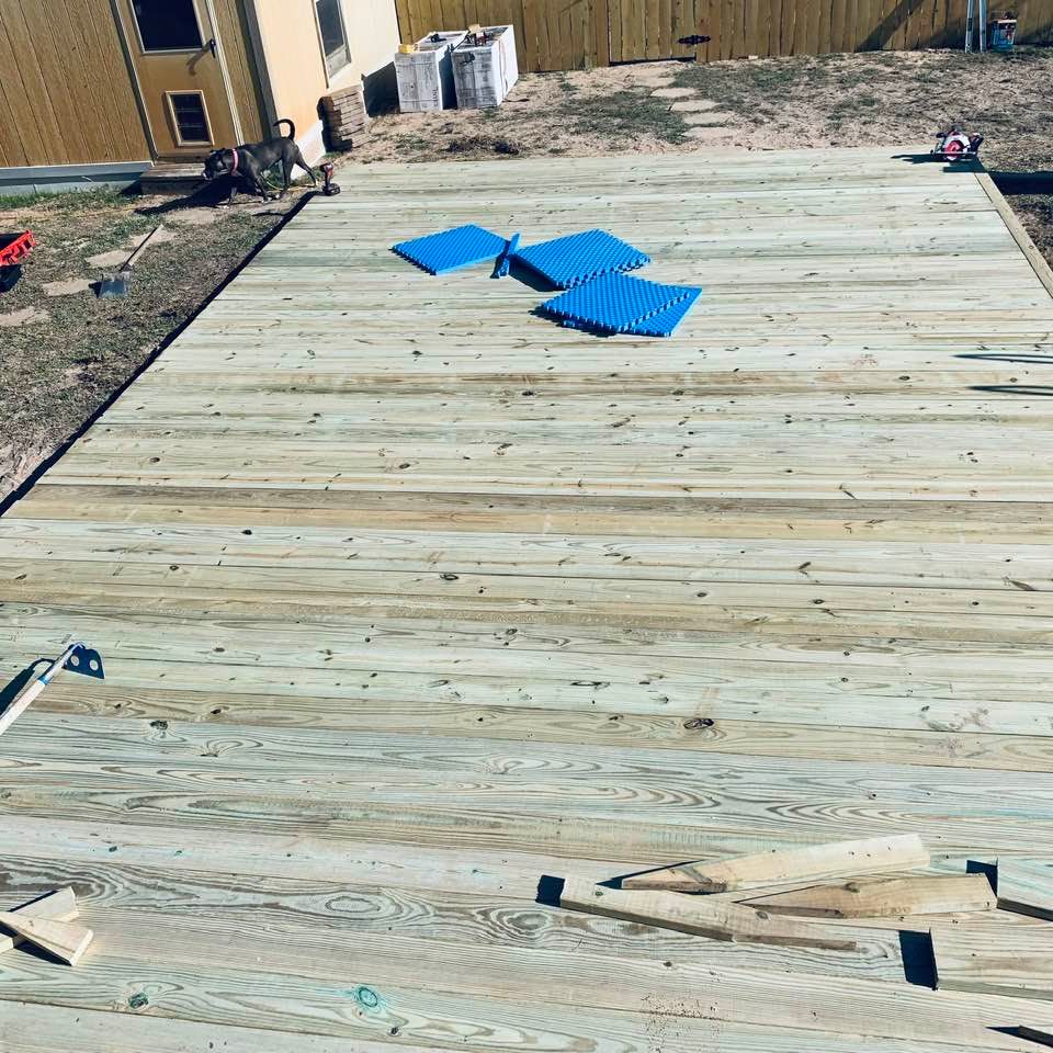 Molly is checking out the new pool deck that Nacho is working on.