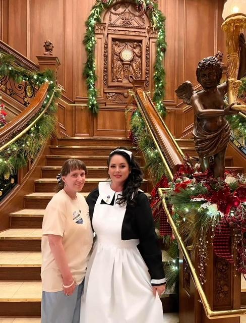 Norma posing with Jamie on the Grand Staircase of the Titanic Museum Attraction in Branson, MO.
