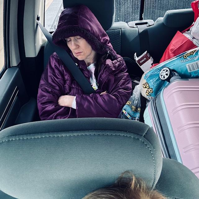 We got up way too early this morning! The backseat was filled with all of Norma's bags.