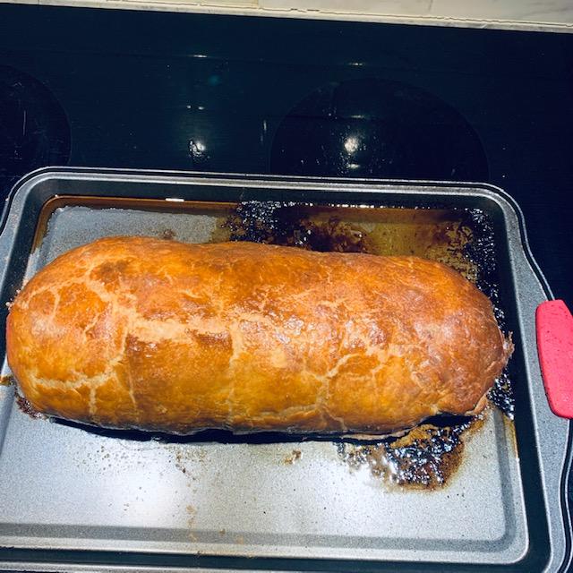 The beef Wellington is done. I should have covered the pan in foil for an easy clean up.