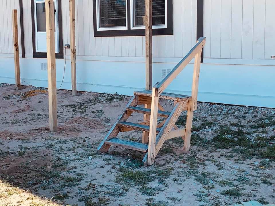 The lovely Palm Harbor staircase that says  "Construction Use Only" is falling apart.