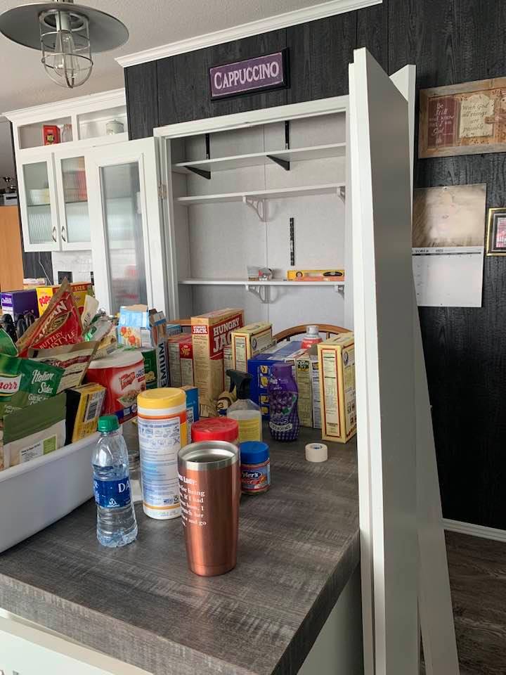 We had to empty the tiny pantry today as David said we were getting new shelves put in. We went from three to six so it holds a lot more and looks neater.