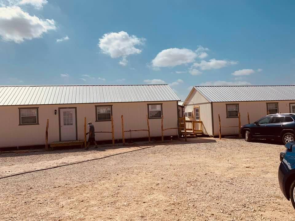 Nacho, owner of Top Notch Lawn Care inspects the work. He has done a lot for us at the farm. He built our chicken coop.