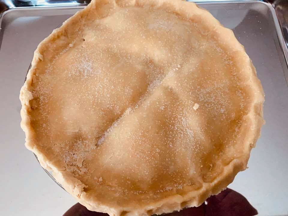 I sprinkle the top pie crust with sugar and then I prick it with a fork. Otherwise, the sugar may block the fork holes. I sprinkle the top pie crust with sugar and then I prick it with a fork. Otherwise, the sugar may block the fork holes.