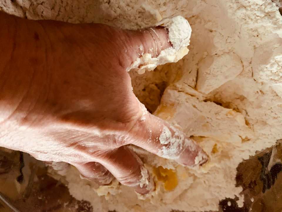 Don't be afraid to use your clean hands to mix your dough. That is why this pie crust recipe works.