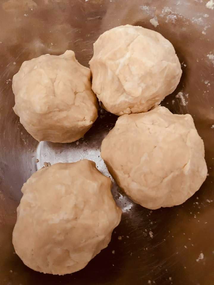 Divide your dough into two halves if you are making one pie or into four quarters if you are making two pies. You can always freeze the dough you don't use for later. Divide your dough into two halves if you are making one pie or into four quarters if you are making two pies. You can always freeze the dough you don't use for later.