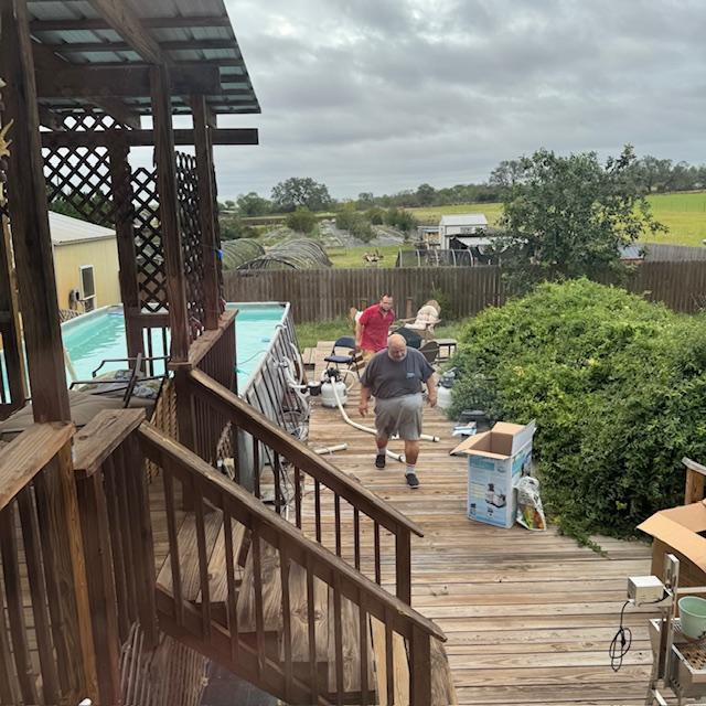 David and Matt installing the new pool pump. The other one died after five years.