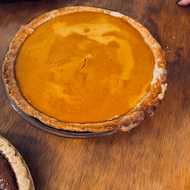 Another beautiful pumpkin pie. It was at the church potluck today.