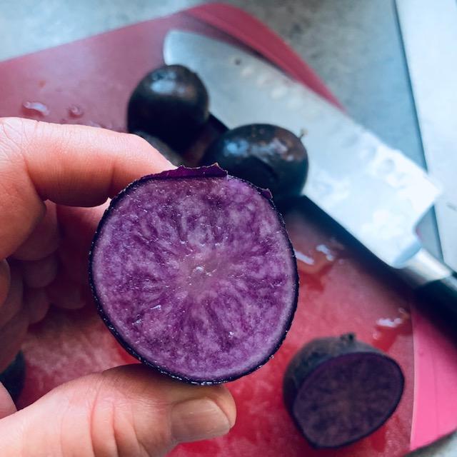 As you know, they dug up some of my potatoes. Here is the inside of one of the Purple Majestic potato. It was good and is pretty.