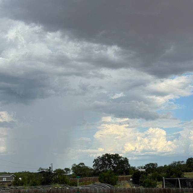 Rain is coming down behind us...Where is our rain?