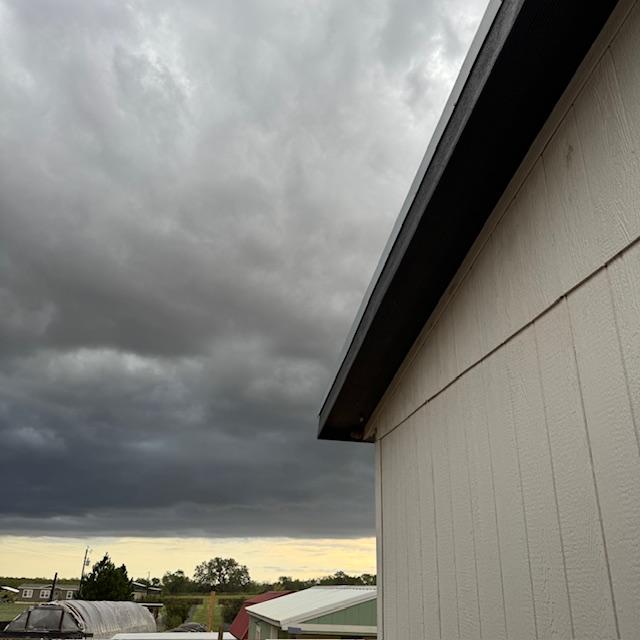 The rain clouds look so much darker than what the camera shows.