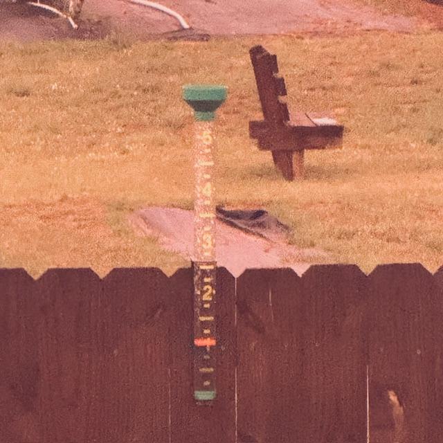 Here is our rain gauge this morning. I took this from the back deck while out with Ethel.