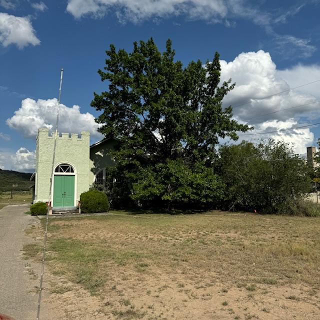 David planted the giant tree when he pastored this church that used to be Jesus Church in Rio Frio, TX. Now it is a vacant building & I am glad. We were thrown out by the former pastor.