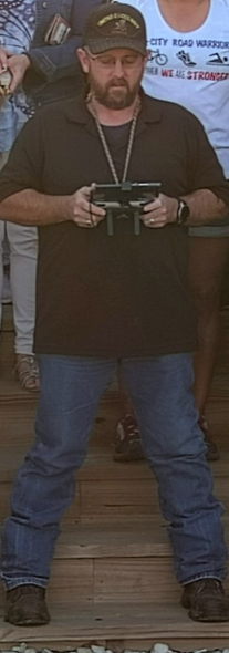 Robert as he operated this awesome commercial drone on our front steps. If you have a farm, his services can help you. Check out the website.