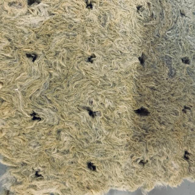 This is rock wool, the medium that you use in hydroponics to plant seeds.