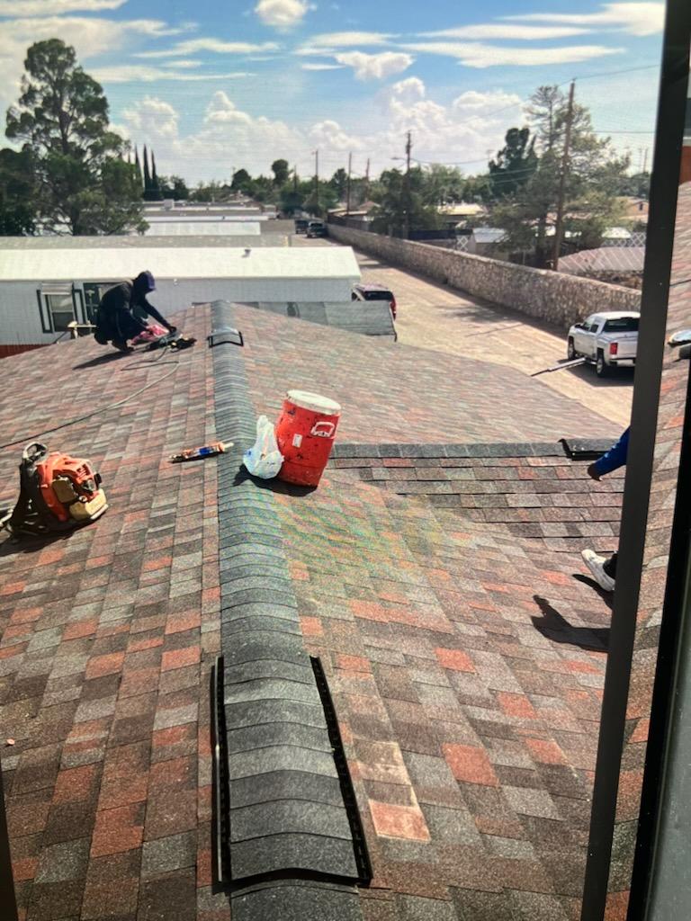 Hopefully, it won't rain in El Paso tonight, but if it does, I think this roof will be able to handle it. Now to fix the ceilings inside...