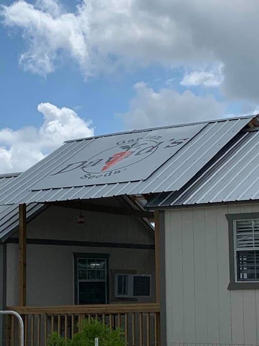 The roof sign looks way too small up there. It would have been better had he propped it up at the top on boards like I wanted. No one listens to my ideas. The roof sign looks way too small up there. It would have been better had he propped it up at the top on boards like I wanted. No one listens to my ideas.