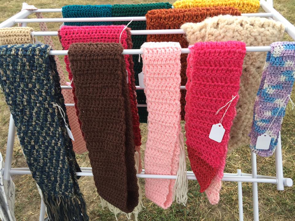 Here are some of the scarves I have recently made. They are shown here at an  outdoor craft fair.